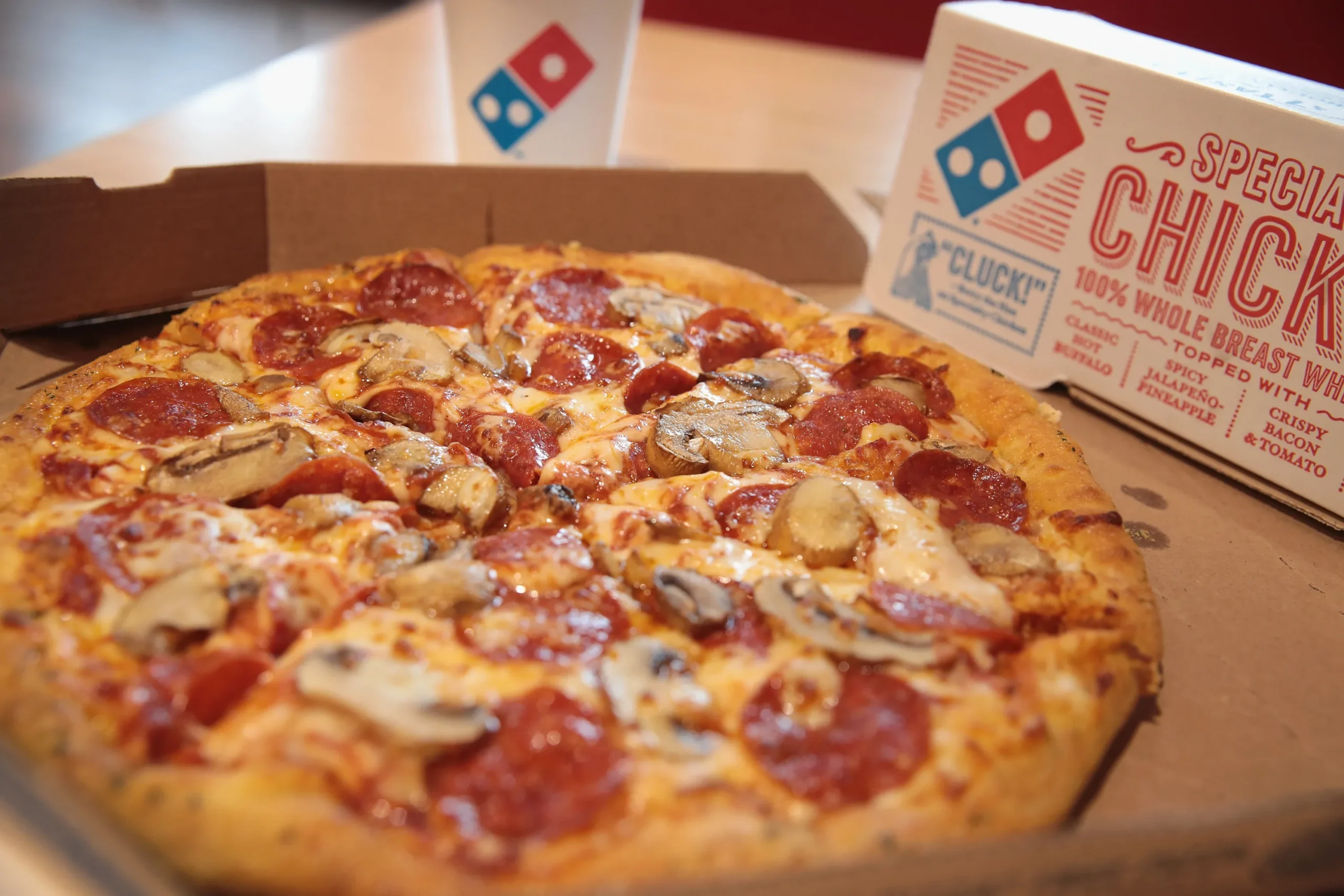 How Domino's is Using Cool New Tech to Whip Up Your Pizza Even Before You Click 'Order'!