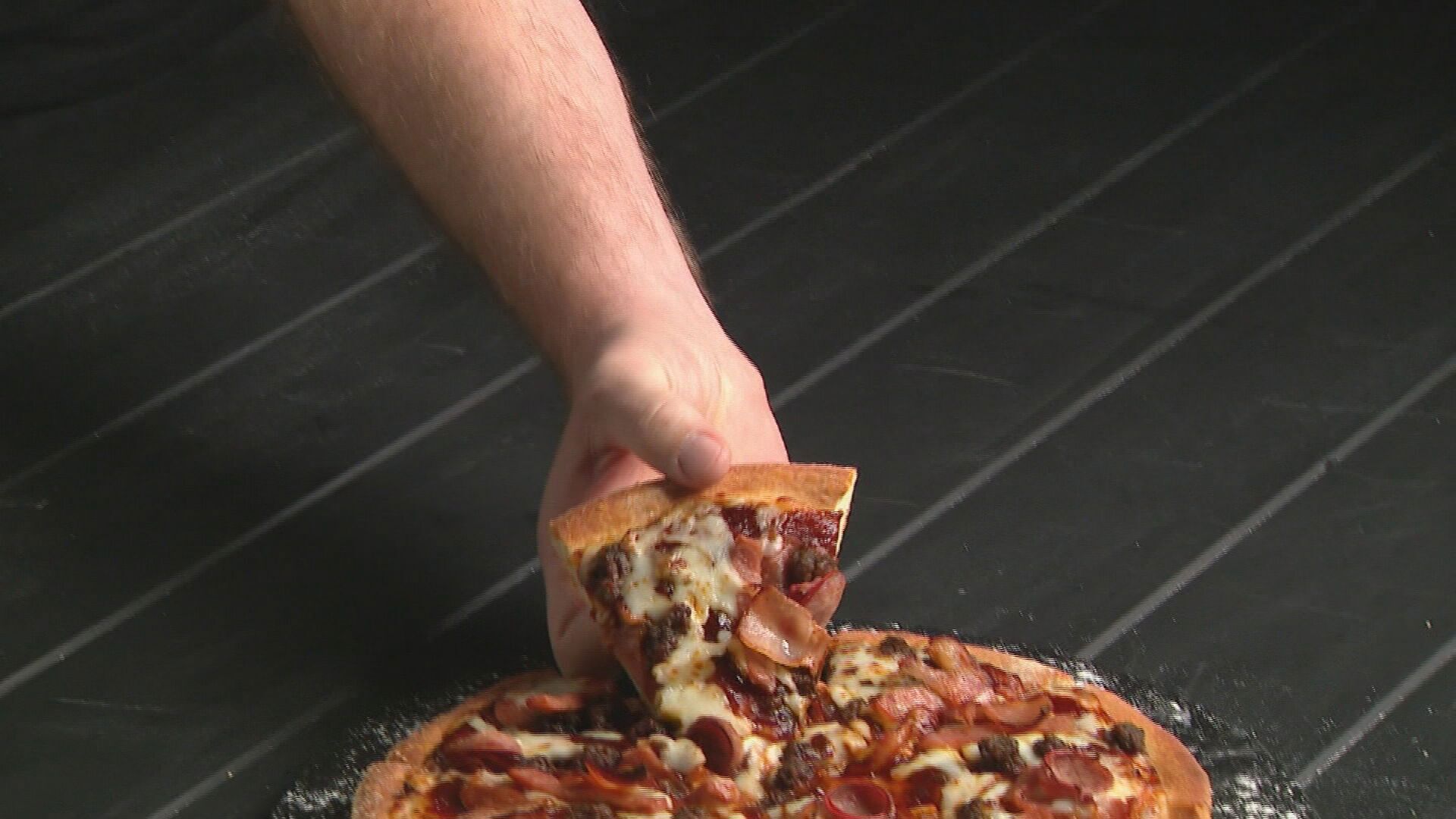 Meet the Schoolteacher Who Landed a $100 Per Hour Job as Domino's Pizza Hand Model--