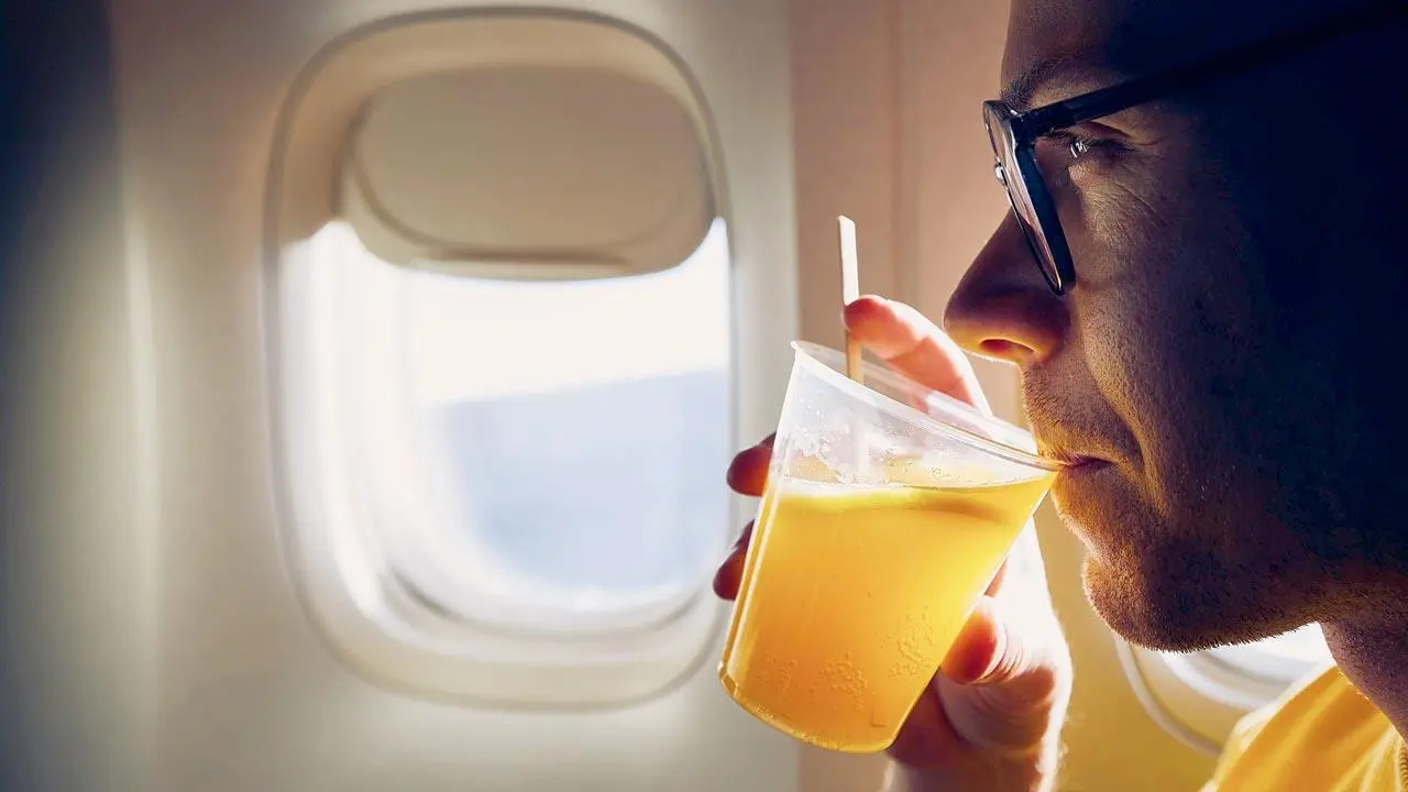 Why Skipping a Drink on Your Next Flight Might Be Your Best Move Study Shows Health Risks-