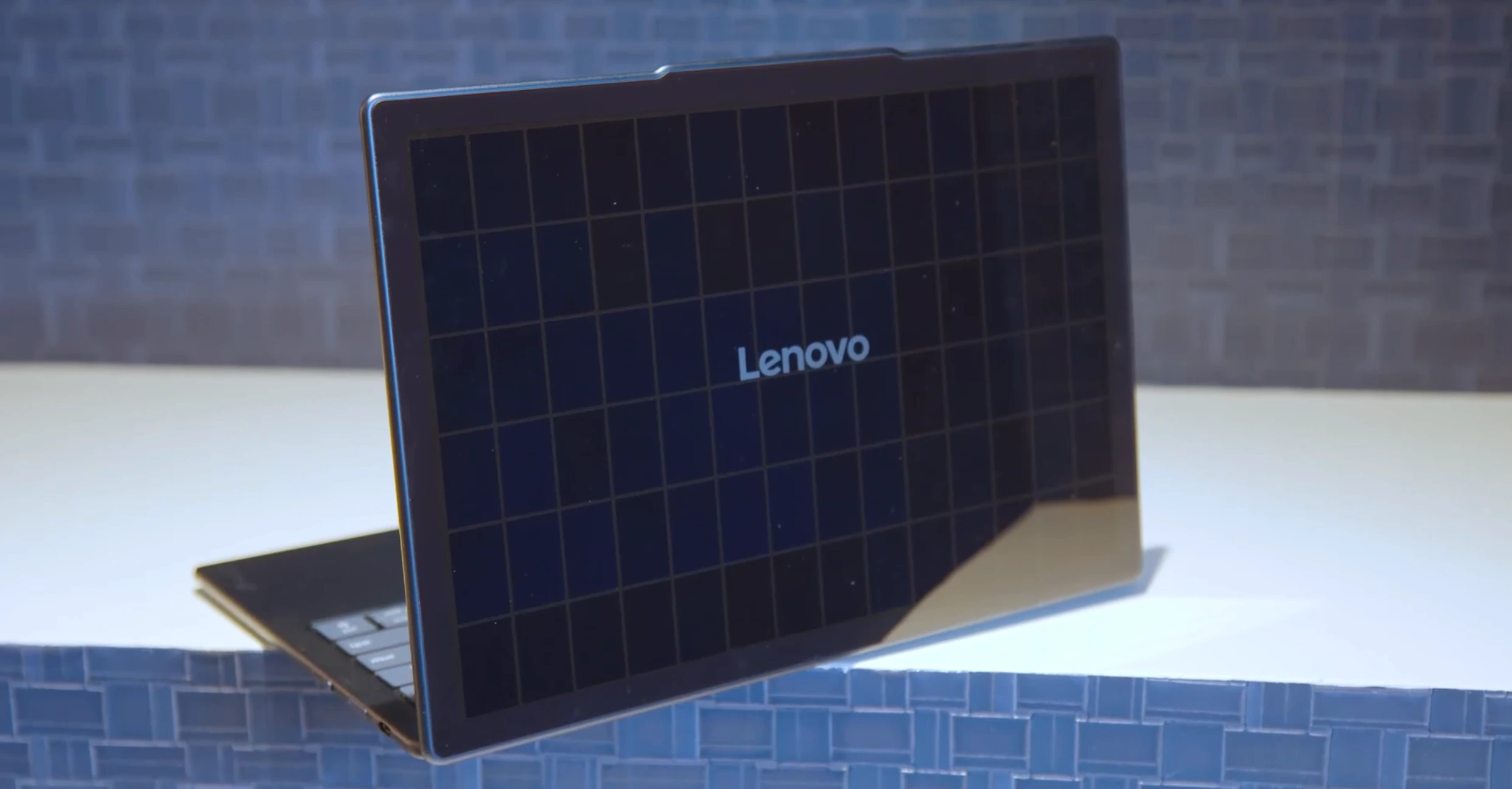 Meet Lenovo's Newest Innovation at MWC 2025 A Super Thin Laptop That Charges in the Sun!----